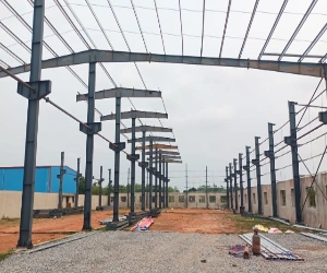 PEB structural frame installation in progress for manufacturing facility in Karnataka