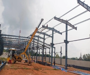 Structural steel erection work for industrial manufacturing facility construction